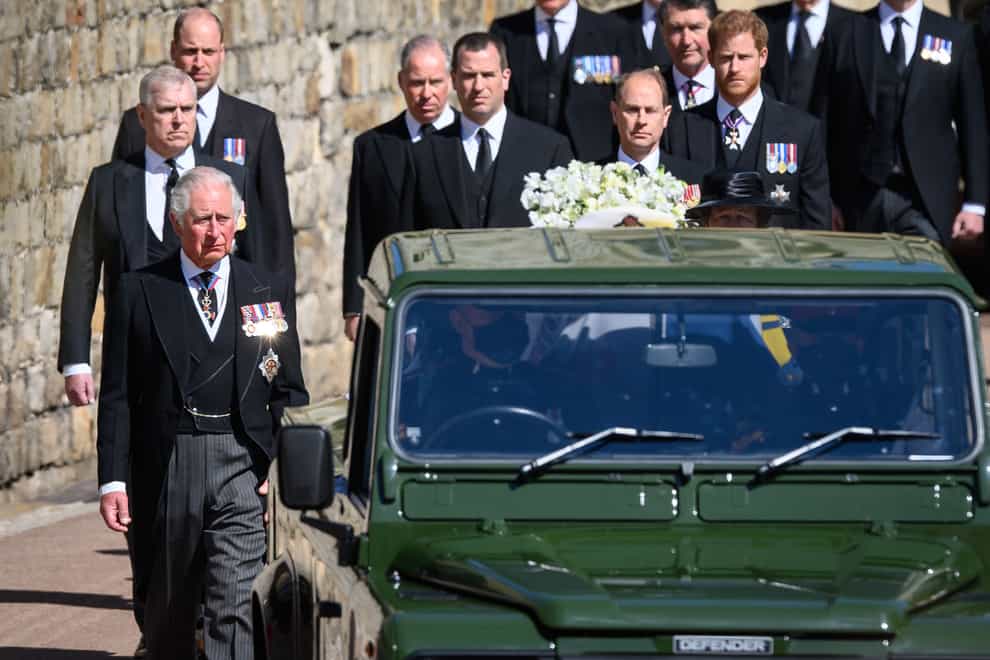 File photo dated 17/4/2021 of members of the Royal family: The Prince of Wales, the Princess Royal, the Duke of York, the Earl of Wessex, the Duke of Cambridge, the Duke of Sussex and Peter Phillips walking behind the Land Rover Defender carrying the coffin of the Duke of Edinburgh during his funeral at Windsor Castle, Berkshire. Issue date: Thursday September 8, 2022. The Duke and Duchess of Sussex plunged the royal family into one of the most challenging periods in modern royal history during the later years of the Queen’s reign but a return to the UK for the funeral could offer Harry the chance to reunite with his family amid their shared grief and heartache for the loss of the Queen.