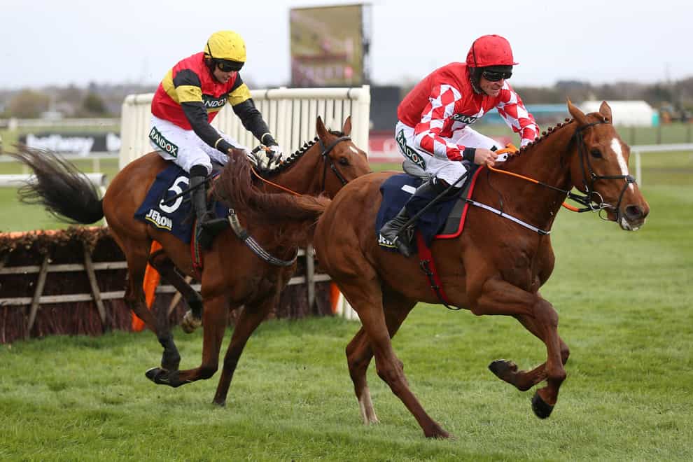 Knight Salute ridden by Paddy Brennan (left) and Pied Piper ridden by Davy Russell jump the last resulting in a dead heat between the two (provisional result) in the Jewson Anniversary 4-Y-O Juvenile Hurdle at Aintree Racecourse, Liverpool. Picture date: Thursday April 7, 2022.