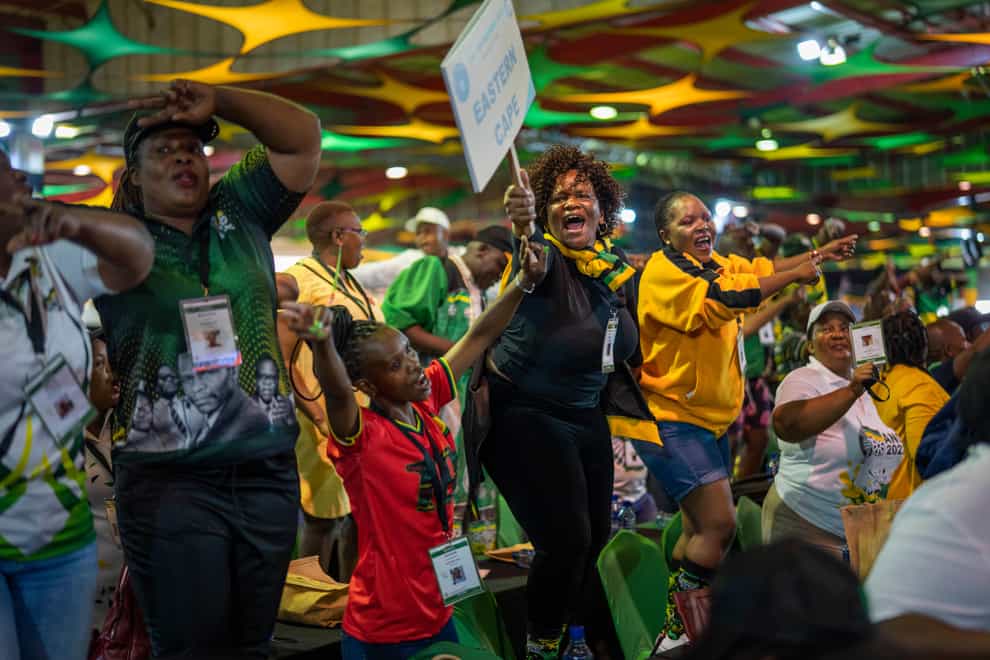 African National Congress delegates cheer as they wait for the start of the ANC national conference in Johannesburg (Jerome Delay/AP)