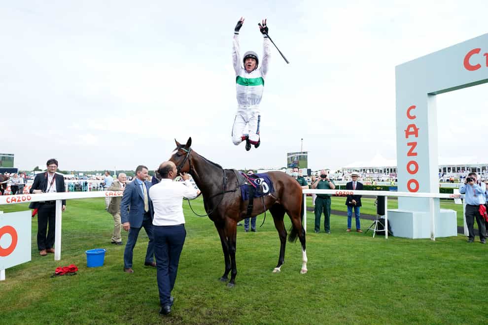 Frankie Dettori leaps from Free Wind (Mike Egerton/PA)