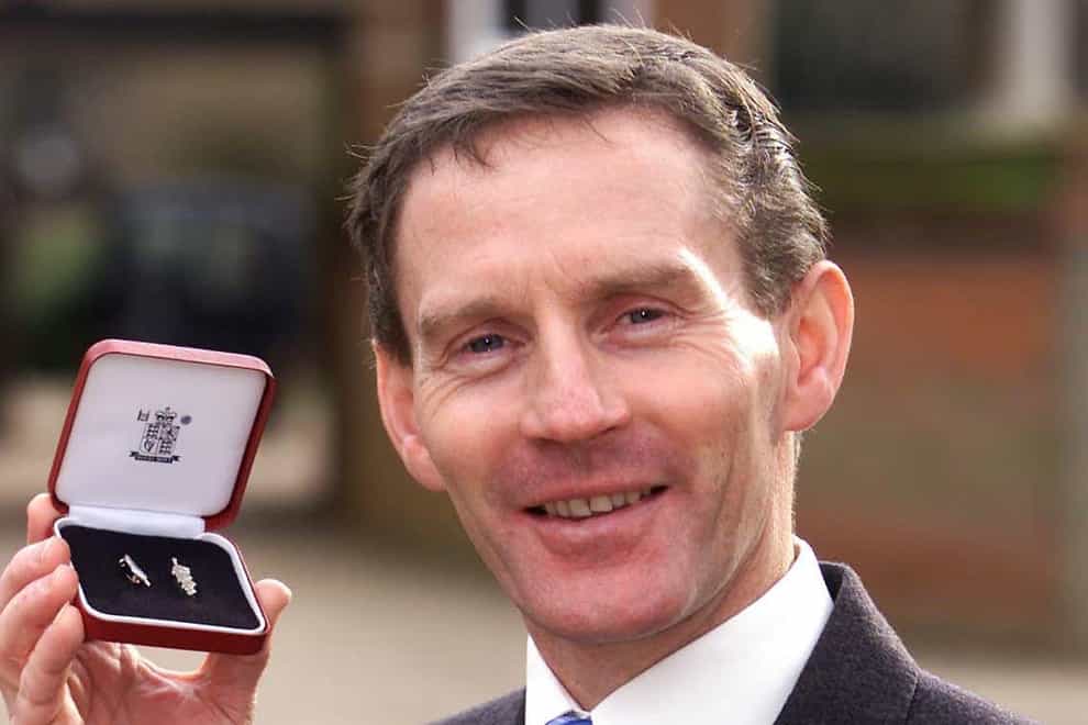 Ray Cochrane holds The Queen’s Commendation For Bravery (Andrew Parsons/PA)