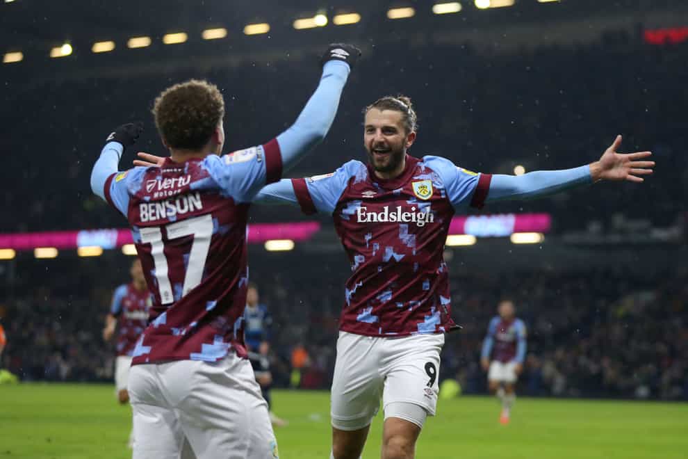 Burnley’s Manuel Benson (left) celebrates his second goal of the game against Middlesbrough (Barrington Coombs/PA)