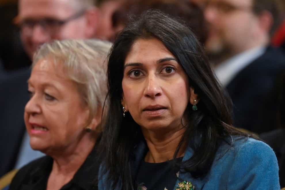 The Home Secretary’s ‘crazy rhetoric’ on migrants is stoking an increase in racism in Britain and ‘normalising’ the politics of Nigel Farage, according to a Government adviser who announced her resignation this week, saying she did not feel comfortable serving under Suella Braverman (Toby Melville/PA)