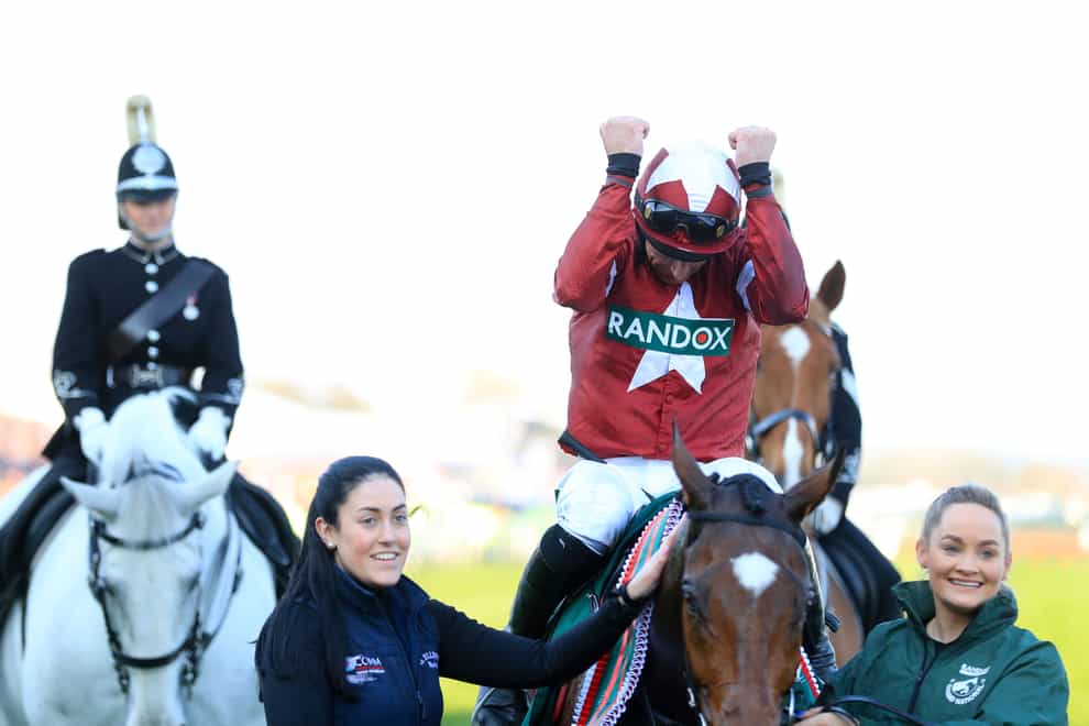 Davy Russell is overcome as he celebrates winning the National with Tiger Roll (Mike Egerton/PA)