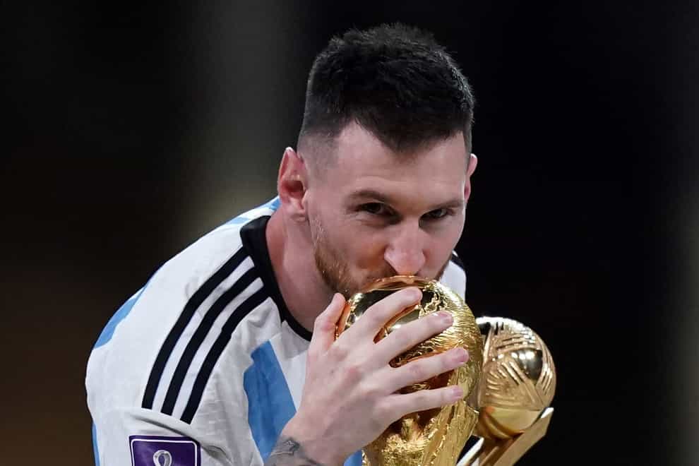 Argentina’s Lionel Messi kisses the World Cup trophy (Mike Egerton/PA)