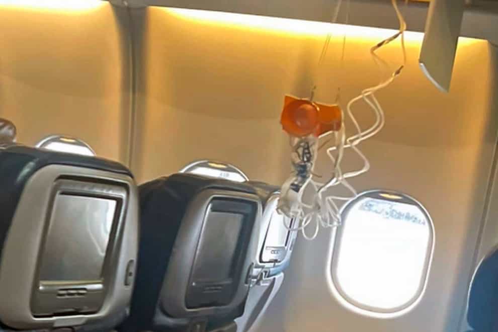 The interior of a Hawaiian Airlines plane on its flight from Phoenix to Honolulu (Jazmin Bitanga via AP)