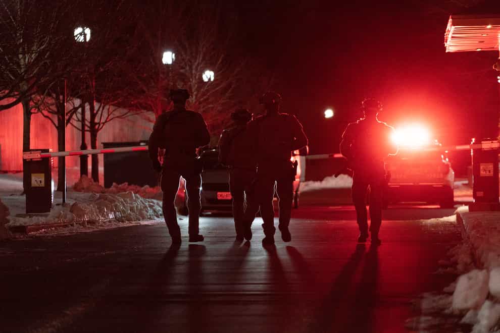 Police tactical officers work the scene of a shooting in Vaughan, Ontario (The Canadian Press via AP)