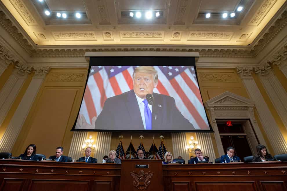 A video of former President Donald Trump is shown on a screen as the House select committee investigating the Jan. 6 attack on the U.S. Capitol holds its final meeting on Capitol Hill in Washington, on December 19, 2022 (Al Drago/Pool Photo via AP/PA)