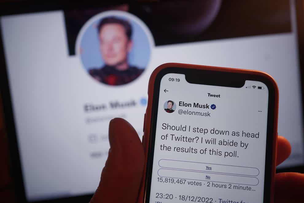 A phone being held showing the twitter poll on screen, in a home in London. Elon Musk looks set to step down from the top job at Twitter after just two months, if he respects the results of an online poll launched on Sunday night. Around 57% of 14 million voters had said that Mr Musk should resign as Twitter chief executive with around three hours to go until the poll closed. Picture date: Monday December 19, 2022.