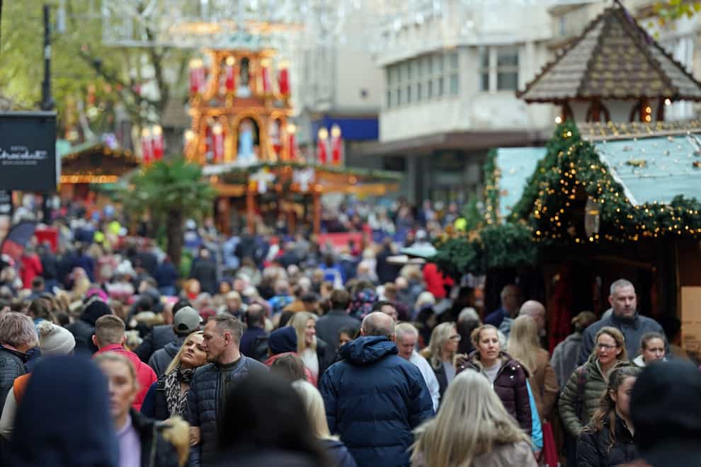 Shoppers on New Street in Birmingham do some Christmas shopping (Jacob King/PA)