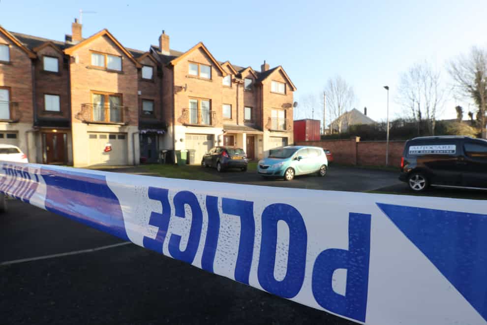 Police activity at a property in the Silverwood Green area of Lurgan (Liam McBurney/PA)