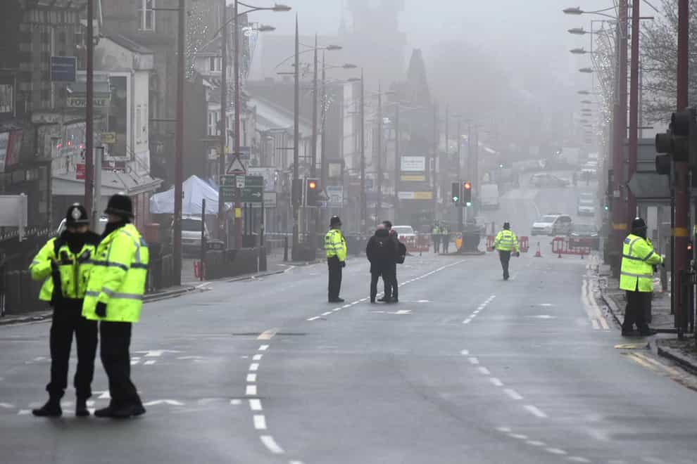 Police in Soho Road, Handsworth, after three people were found with injuries believed to be stab wounds (Matthew Cooper/PA)