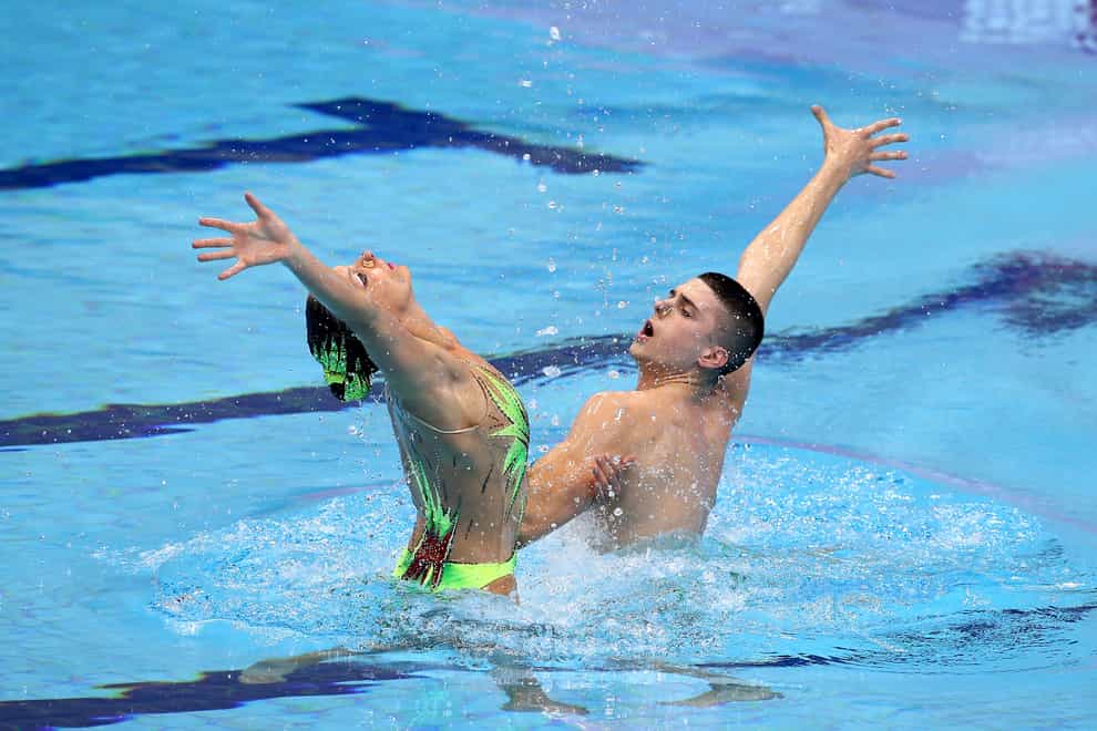 Giorgio Minisini, right, was world champion at the FINA World Aquatics Championships in the mixed duet technical routine in 2017 and 2022 (John Walton/PA)