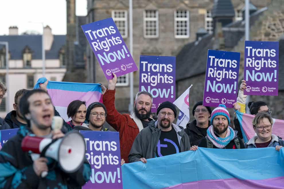 Supporters of the Gender Recognition Reform Bill (Scotland) rallied outside Holyrood while MSPs debated the legislation (PA)