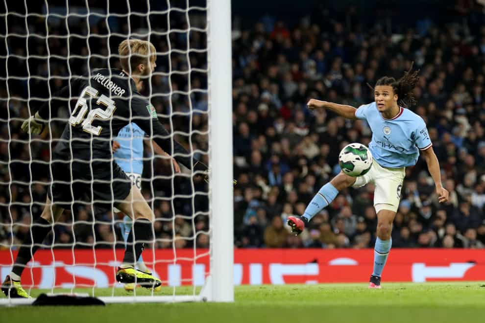 Manchester City’s Nathan Ake scores his sides third goal during the Carabao Cup fourth round match at the Etihad Stadium, Manchester. Picture date: Thursday December 22, 2022.