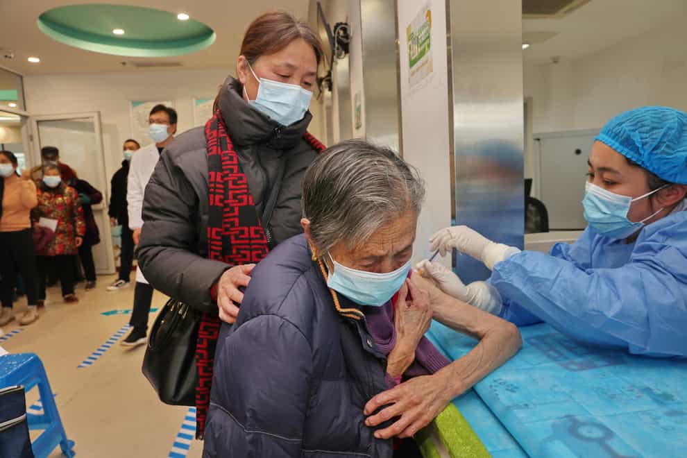 A nurse gives a Covid vaccine in Nantong in eastern China’s Jiangsu province (Chinatopix Via AP)