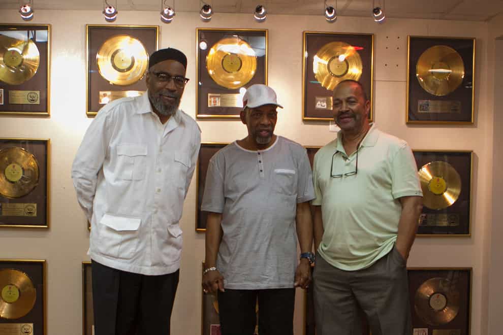 Musicians Kenneth Gamble, left, Leon Huff, centre, and Thom Bell (right) stand together at Gamble and Huff Music, in Philadelphia (Stephanie Aaronson/The Philadelphia Inquirer via AP)