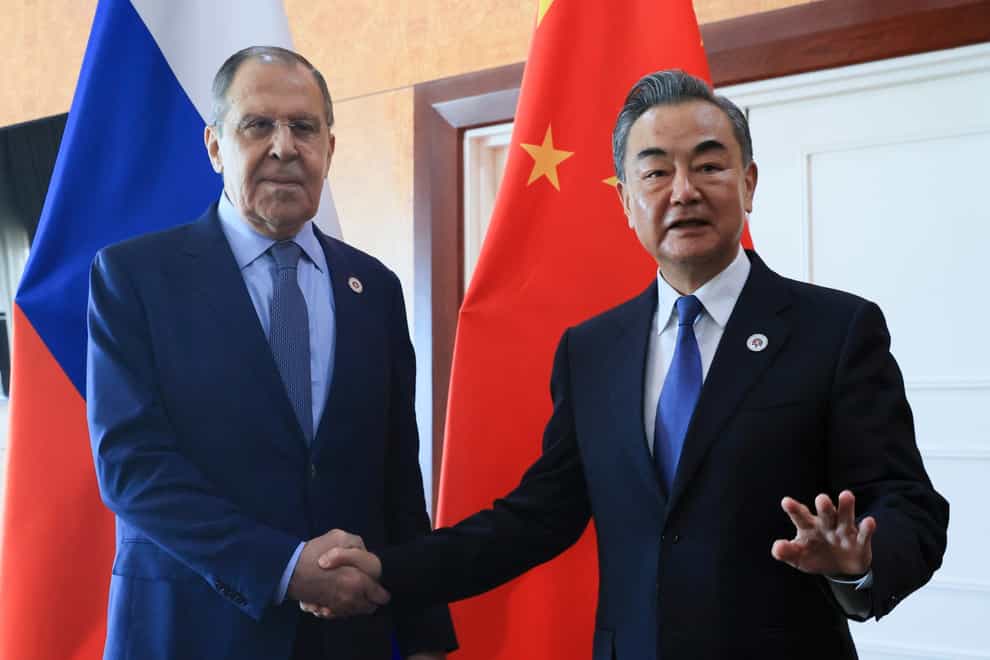 Chinese Foreign Minister Wang Yi has defended his country’s position on the war in Ukraine and signalled that China will deepen ties with Russia in the coming year (Russian Foreign Ministry Press Service/AP)