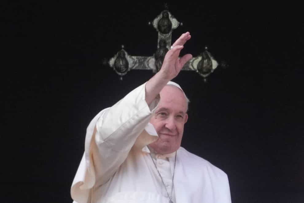 Pope Francis waves to faithful at the end of the Urbi et Orbi (Gregorio Borgia/AP)