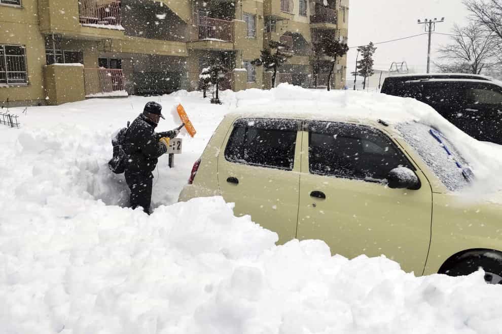 Heavy snow in large swaths of Japan has killed 17 and injured more than 90 people and left hundreds of homes without power, disaster management officials said on Monday (Kyodo News/AP)