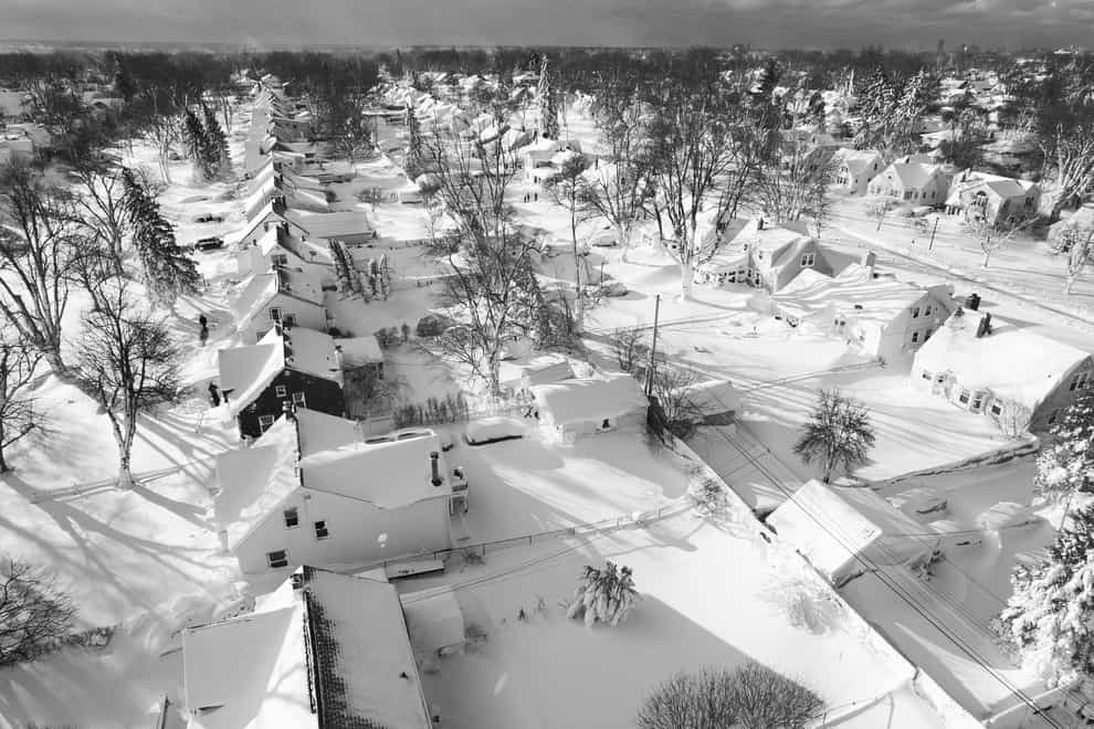 In this drone image, snow blankets a neighbourhood in Cheektowaga, New York (John Waller via AP)