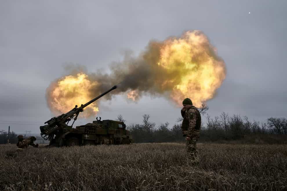 Ukrainian soldiers fire a French-made Caesar self-propelled howitzer towards Russian positions near Avdiivka, Donetsk region, Ukraine, on Monday, December 26 2022 (Libkos/AP)