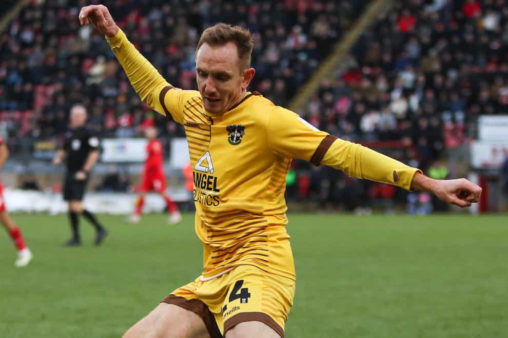 Rob Milsom sealed victory for Sutton from the spot (Kieran Cleeves/PA)