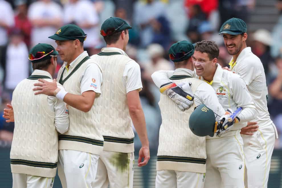 Australia players celebrate after they defeated South Africa by an innings and 182 runs (Asanka Brendon Ratnayake/AP)