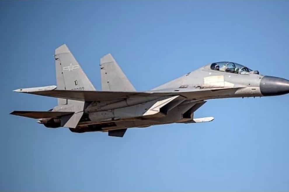 A Chinese PLA J-16 fighter jet flies in an undisclosed location (Taiwan Ministry of Defence/AP)