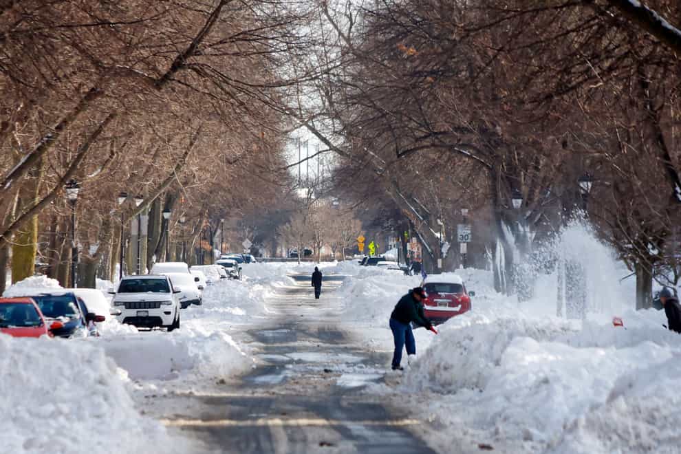 Snow is cleared in Buffalo city (Jeffrey T. Barnes/AP)