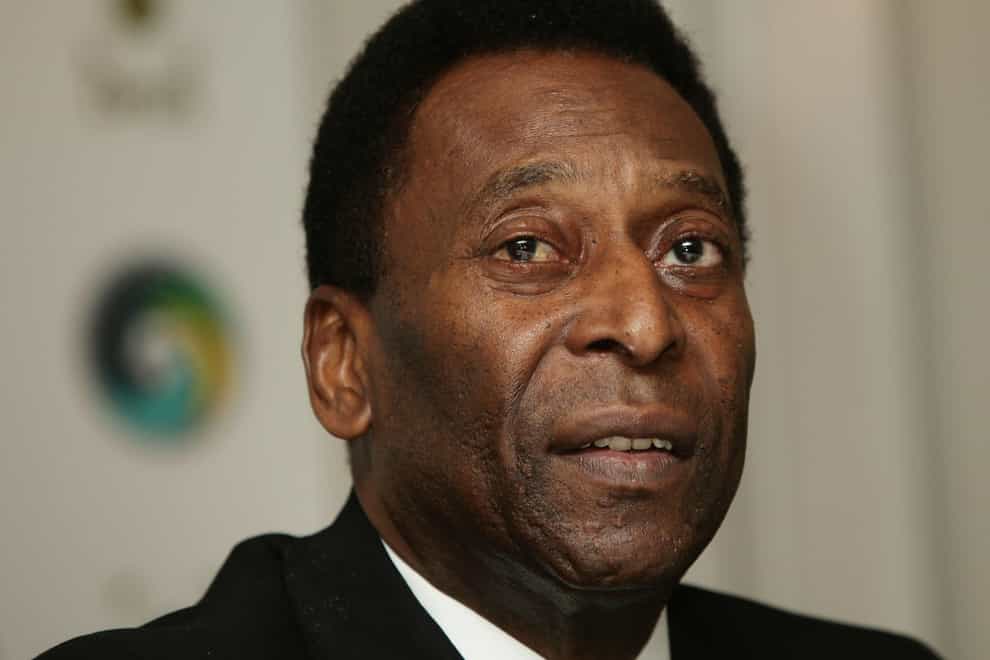 Brazilian football great Pele has died at the age of 82 (Yui Mok/PA)