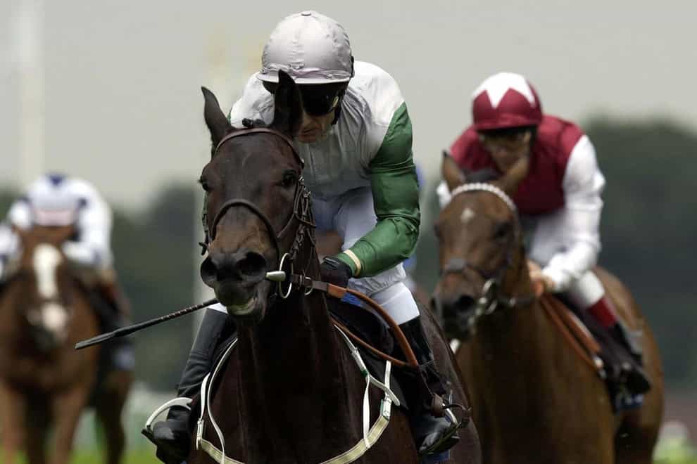 Kevin Darley rides Attraction, owned by the Duke of Roxburghe, to victory in the The Queen Mary Stakes, at Royal Ascot.
