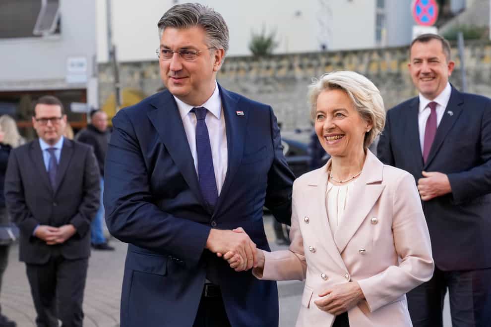 Croatia’s Prime Minister Andrej Plenkovic shakes hands with Ursula von der Leyen, president of the European Commission, in Zagreb, Croatia (Darko Bandic/AP)