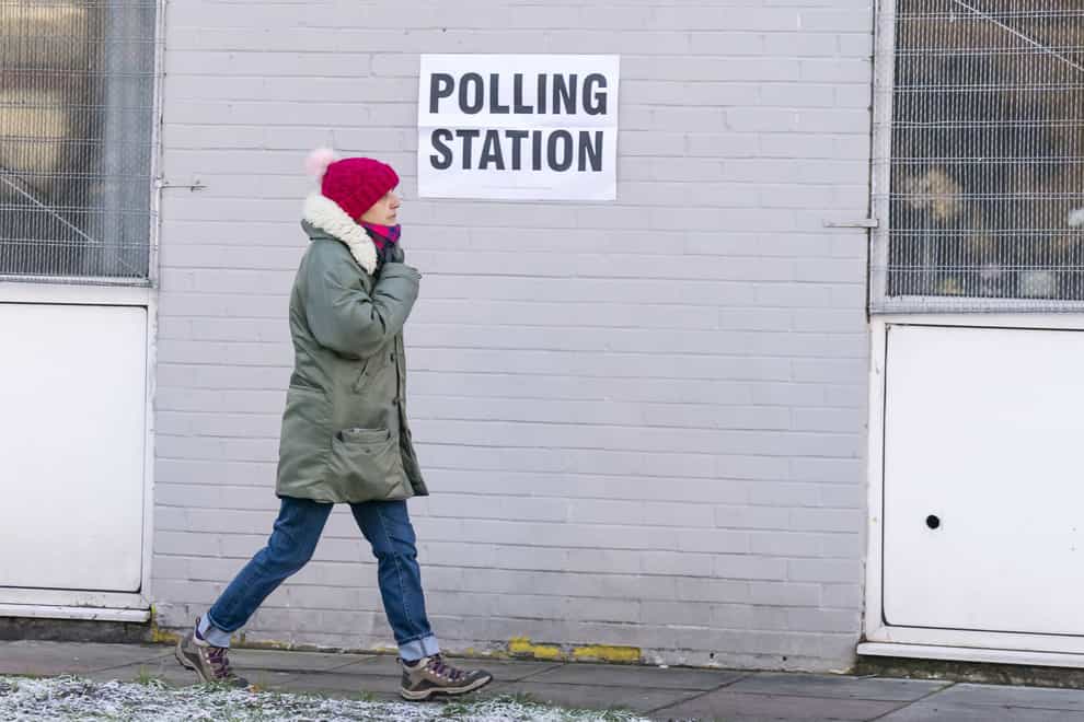 A woman arrives at Sharon Youth Centre in Stretford to vote in the Stretford and Urmston by-election (Danny Lawson/PA)