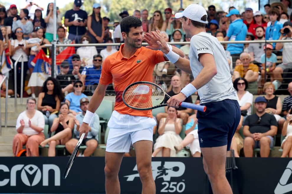 Novak Djokovic (left) teamed up with Vasek Pospisil in Adelaide (Kelly Barnes/AP)