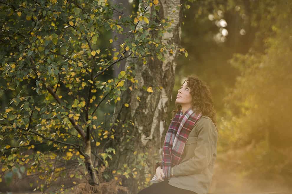 A woman enjoying nature in the Peak District (Ben Andrews/RSPB/PA)