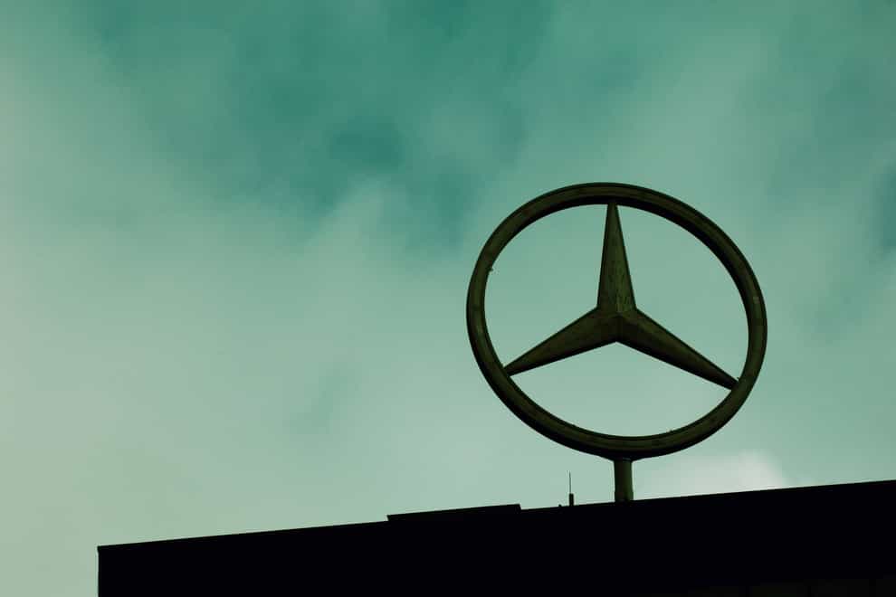 The Mercedes Benz logo on top of a building in Berlin, Germany (Itani/Alamy/PA)