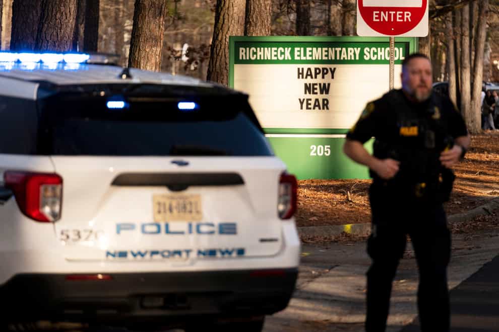 Police respond to a shooting at Richneck Elementary School in Newport News, Virginia (Billy Schuerman/The Virginian-Pilot via AP)