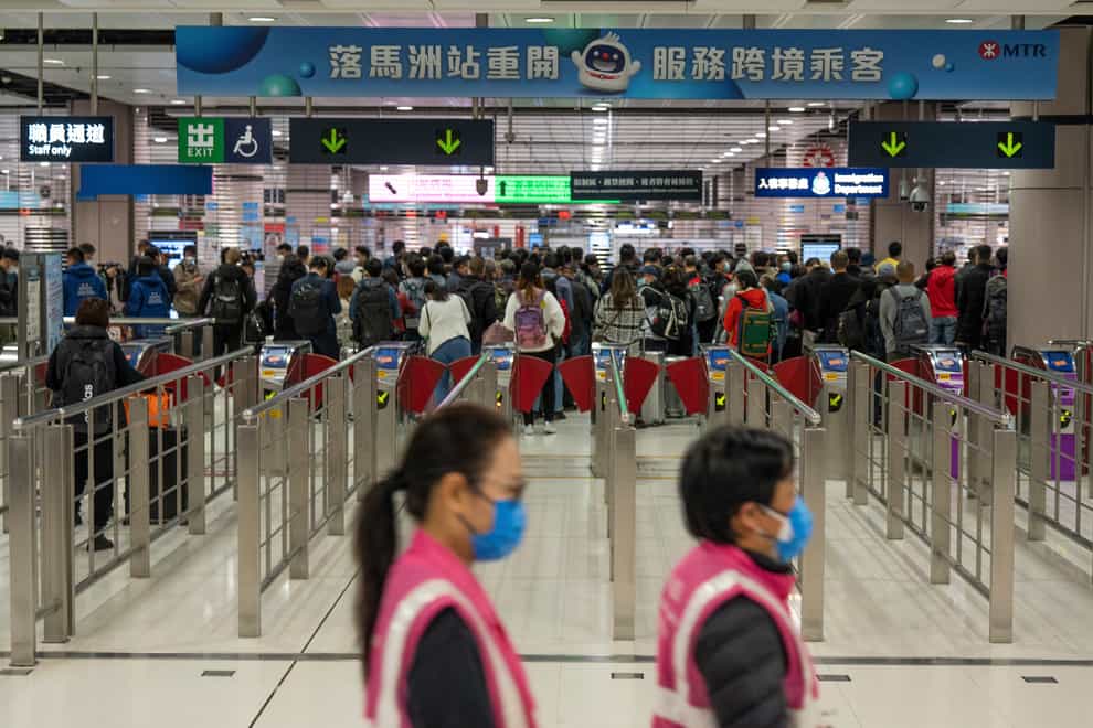 China eases Covid-19 travel restrictions (Bertha Wang/AP)