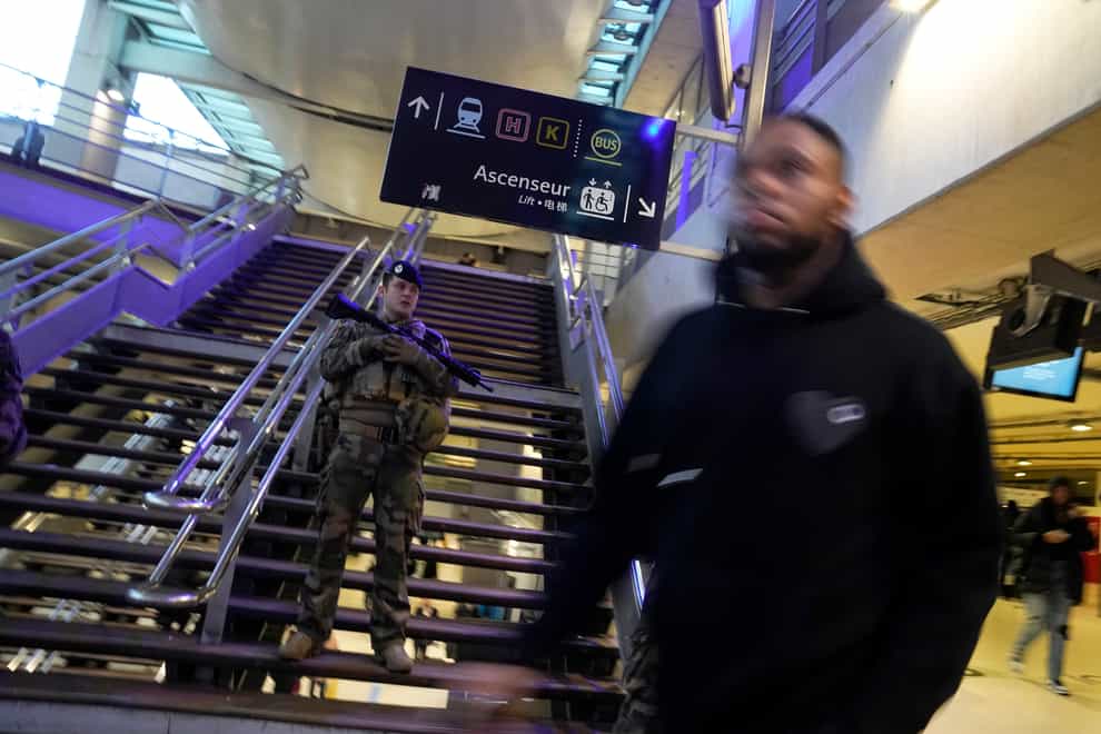 A soldier patrols at the Gare du Nord train station (AP)