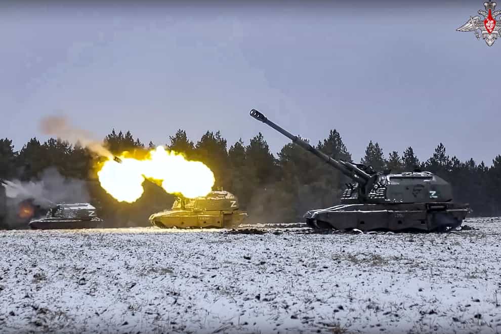 Russian self-propelled 152.4 mm howitzers Msta fire on a mission at an undisclosed location in Ukraine (Russian Defence Ministry Press Service via AP)