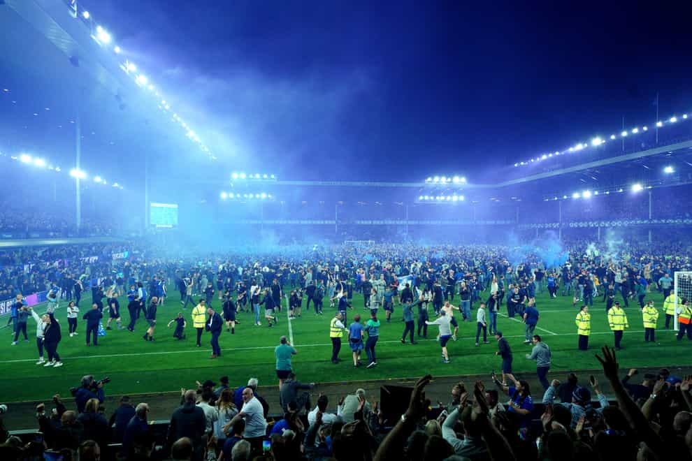 Fans invade the pitch at Goodison Park at the end of last season (Peter Byrne/PA).