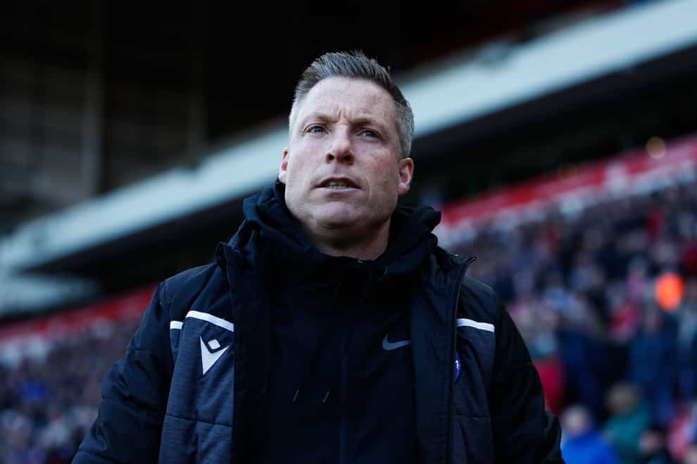 Gillingham Head Coach, Neil Harris, looks on during the Sky Bet League One match at the Stadium of Light, Sunderland. Picture date: Saturday April 2, 2022.