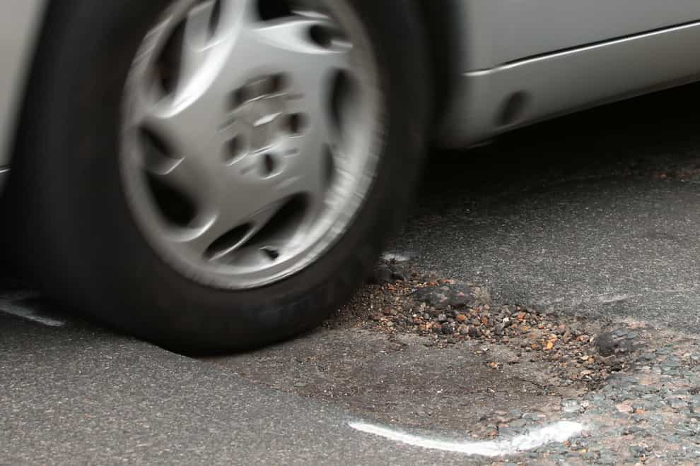 Pothole-related vehicle breakdowns surged during the last three months of 2022, figures suggest (Yui Mok/PA)