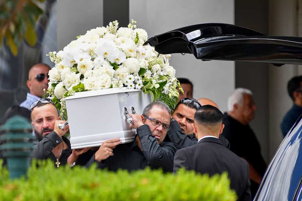 The casket of Vanessa Tadros is carried during her funeral in Sydney (AAP Image via AP)