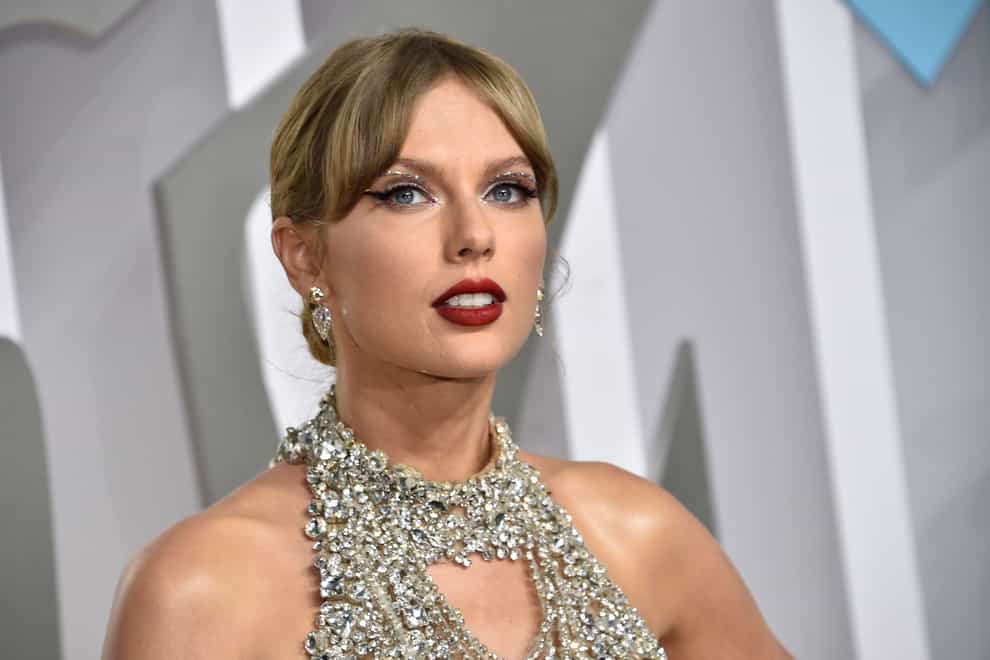 One of Taylor Swift’s guitars will be sold for charity (Evan Agostini/Invision/AP)