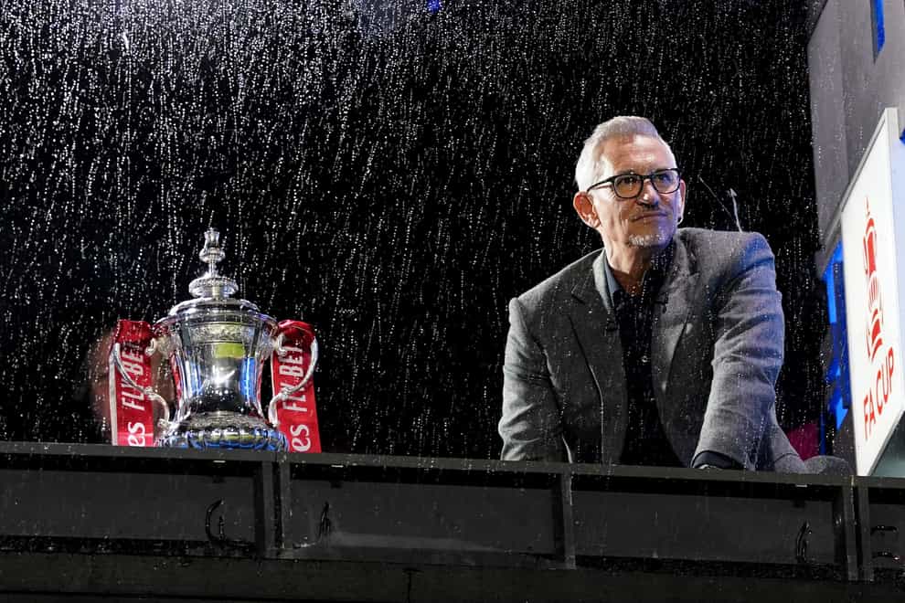 BBC presenter Gary Lineker with the FA Cup as the BBC apologised for a prank (Nick Potts/PA)