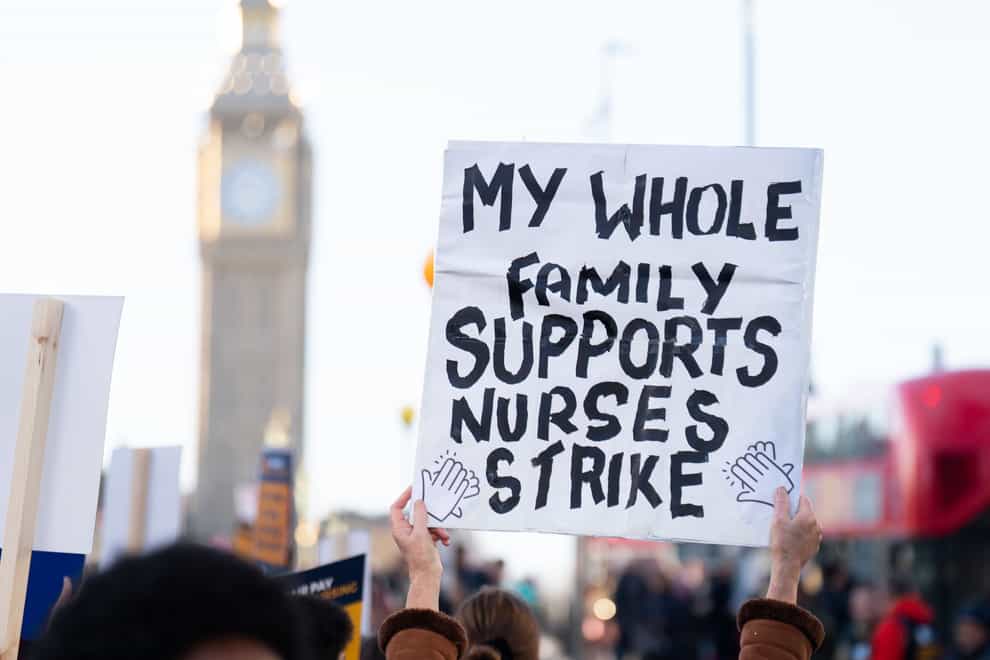 Members of the Royal College of Nursing (RCN) on the picket line outside St Thomas’ Hospital, central London, in December (PA)