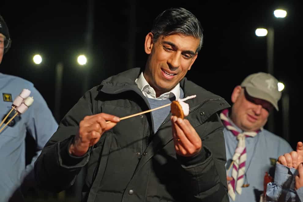 Prime Minister Rishi Sunak toasts a S’mores in Scotland (Andrew Milligan/PA)