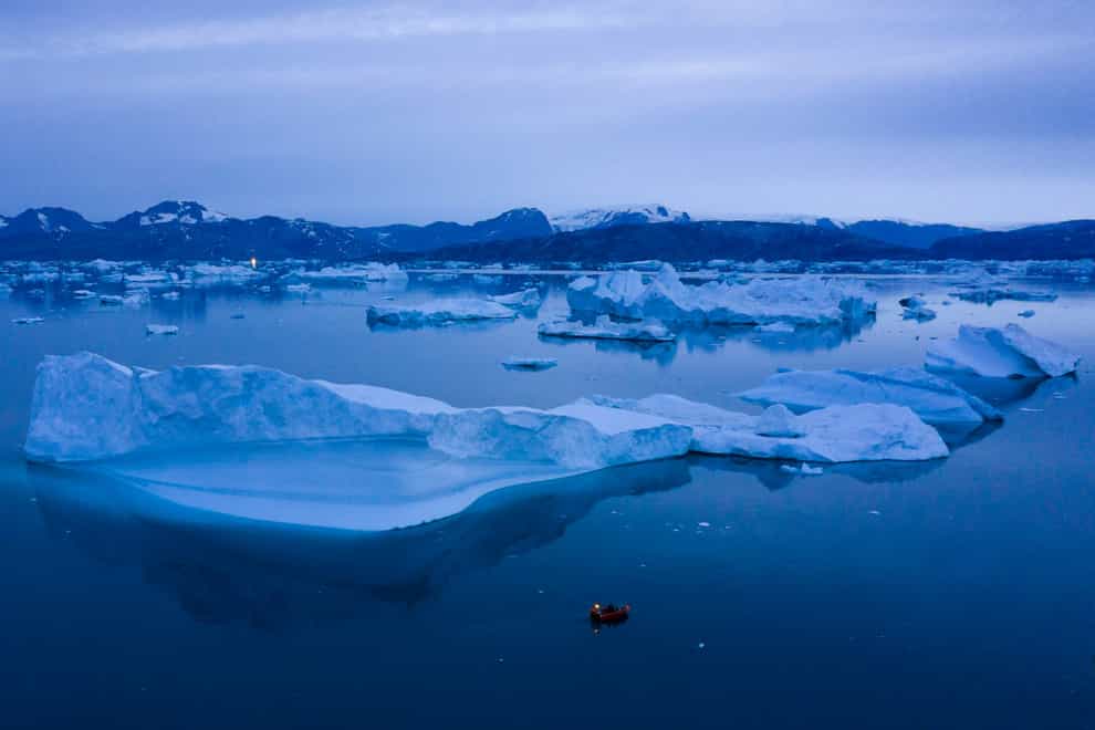 A sharp spike in Greenland temperatures since 1995 showed the giant northern island 2.7 degrees (1.5 degrees Celsius) hotter than its 20th-century average, the warmest in more than 1,000 years, according to new ice core data (Felipe Dana/AP/PA)